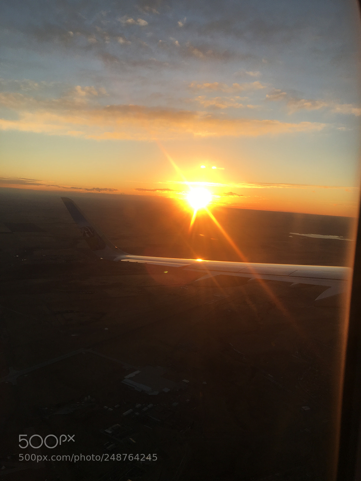 Apple iPhone 6s Plus sample photo. Departing photography