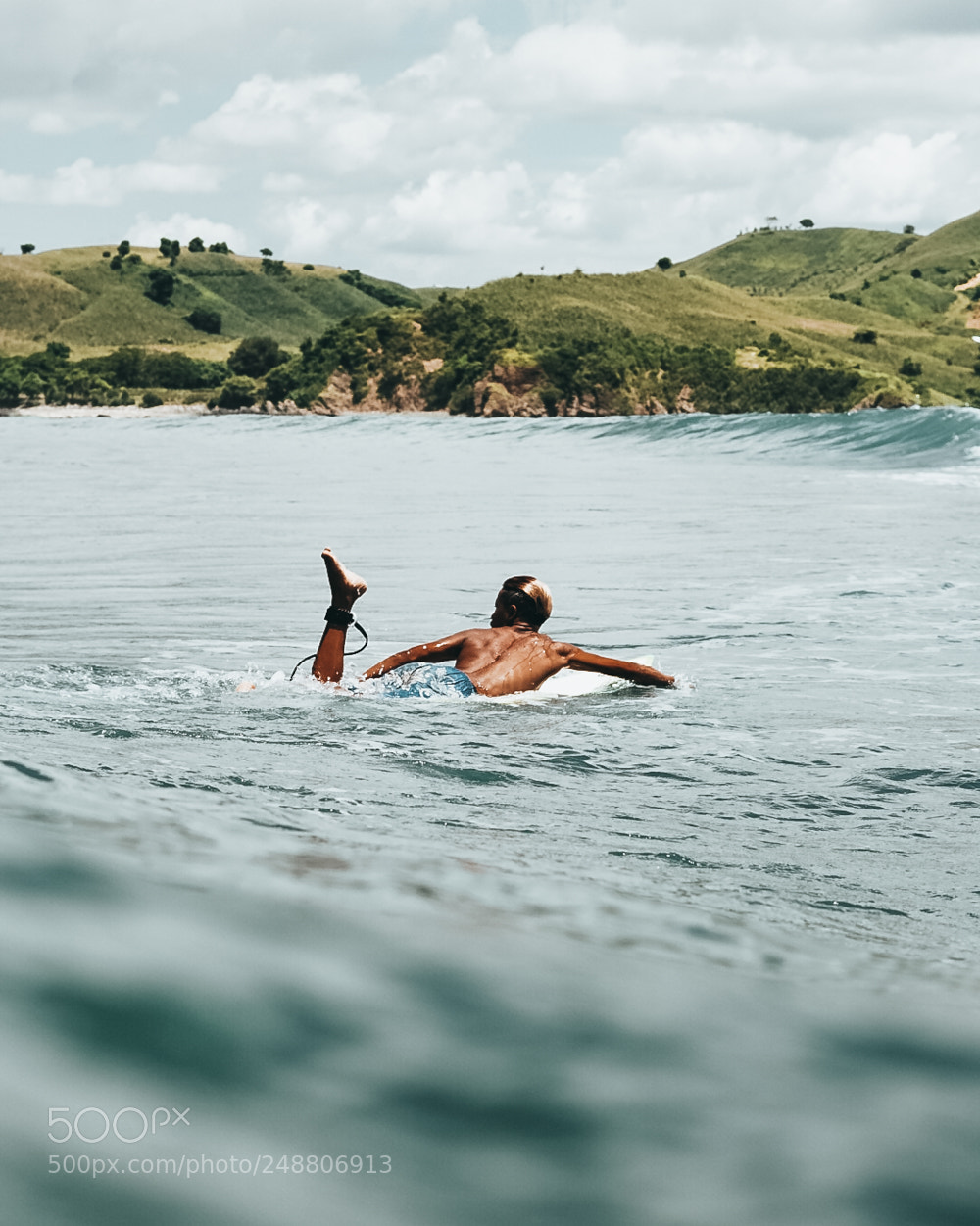 Sony a6500 sample photo. Surfer paddling for a photography