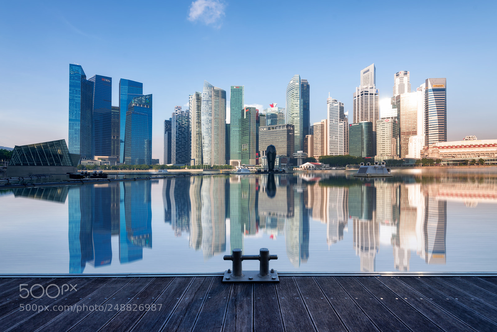 Nikon D610 sample photo. Skyscraper reflection at marina photography