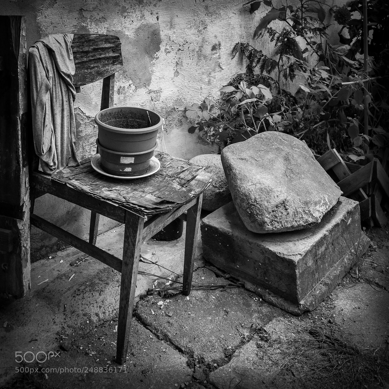 Nikon D610 sample photo. Chair, pot and stone photography