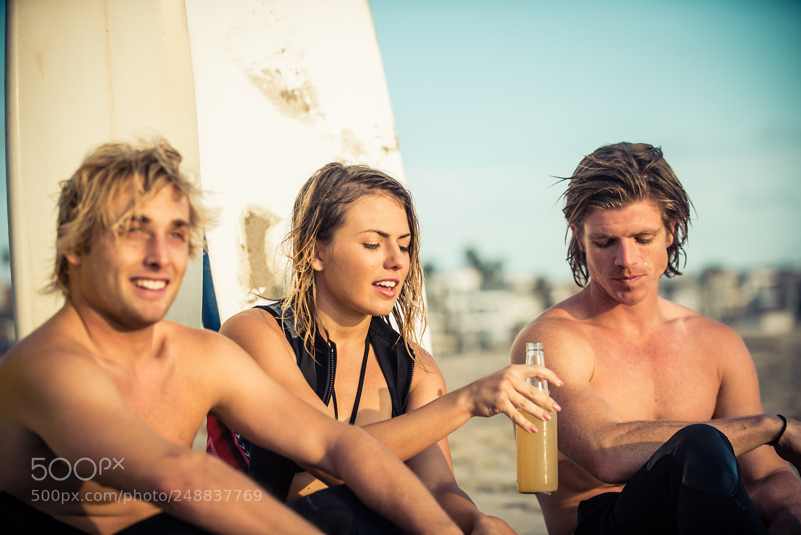 Nikon D610 sample photo. Three surfers relaxing on photography