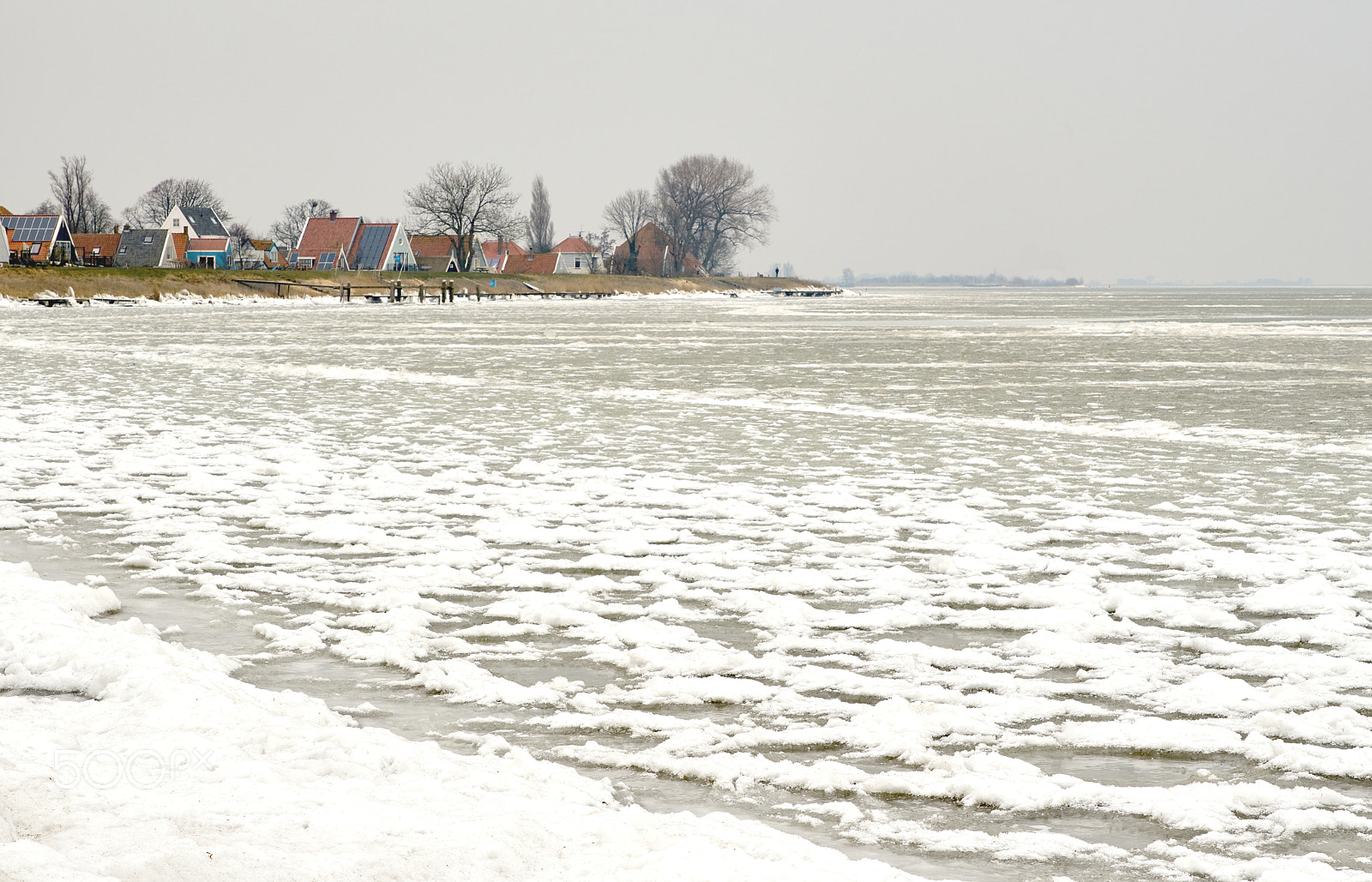 Sony ILCA-77M2 sample photo. Village behind the dyke photography