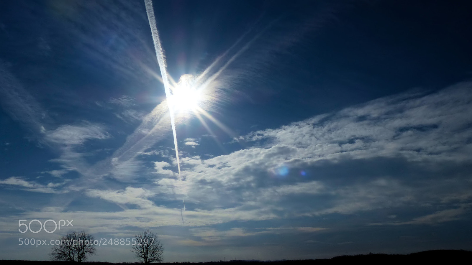 Panasonic Lumix DMC-FZ200 sample photo. Contrails photography