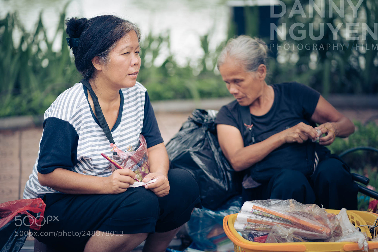Sony a9 sample photo. Lady by the street photography
