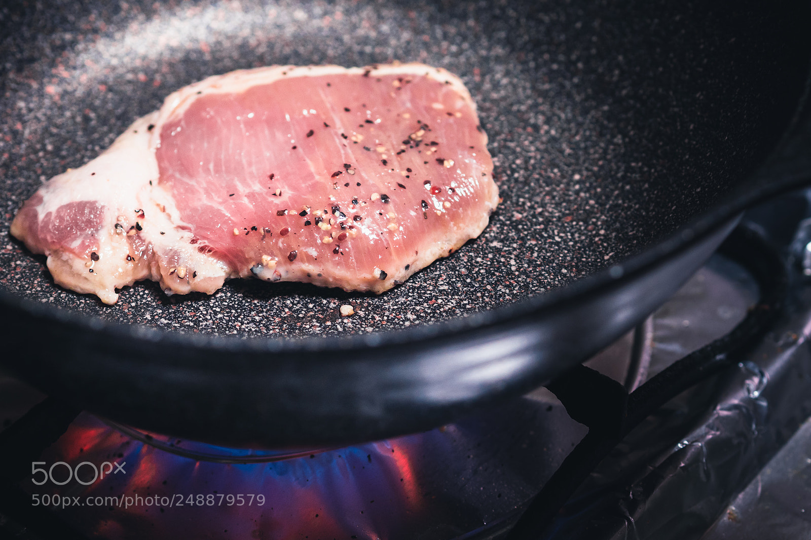 Olympus PEN-F sample photo. Cooking a tenderloin pork photography