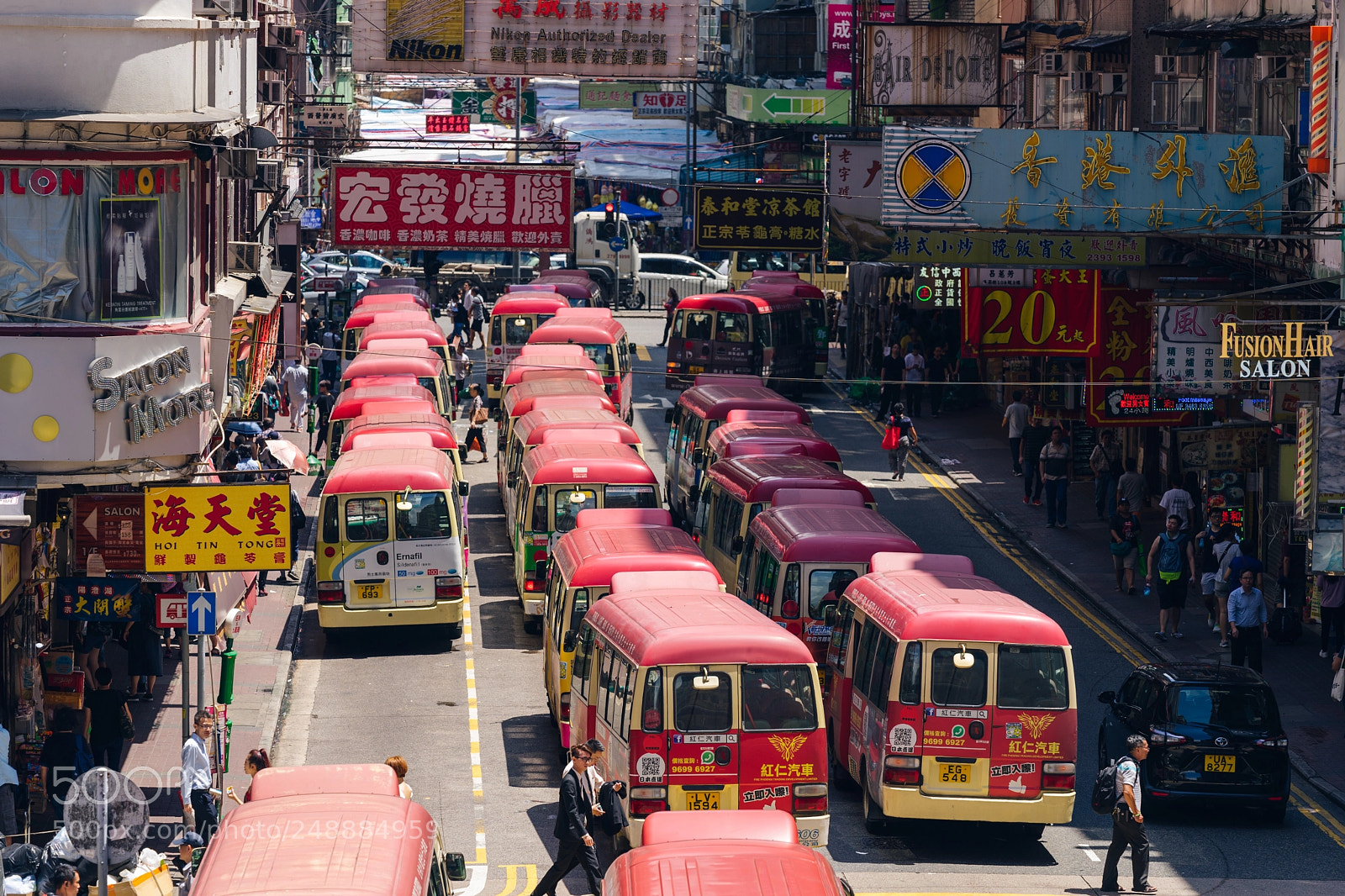 Sony a7 sample photo. Red minibuses lining up photography