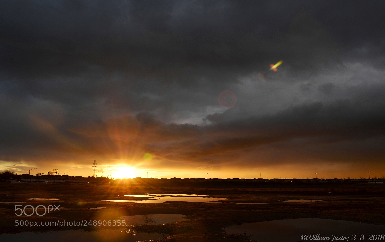 Nikon D5100 sample photo. A stormy sunset in photography