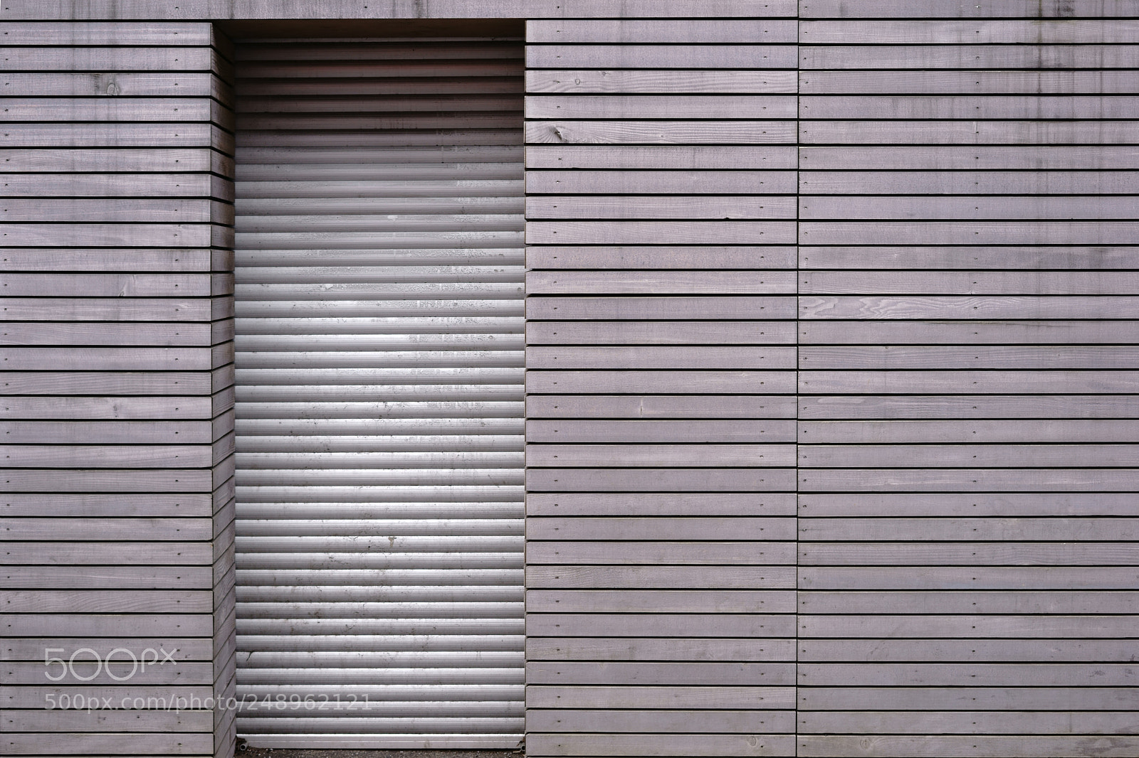 Sony a7 II sample photo. Wood paneling with door photography