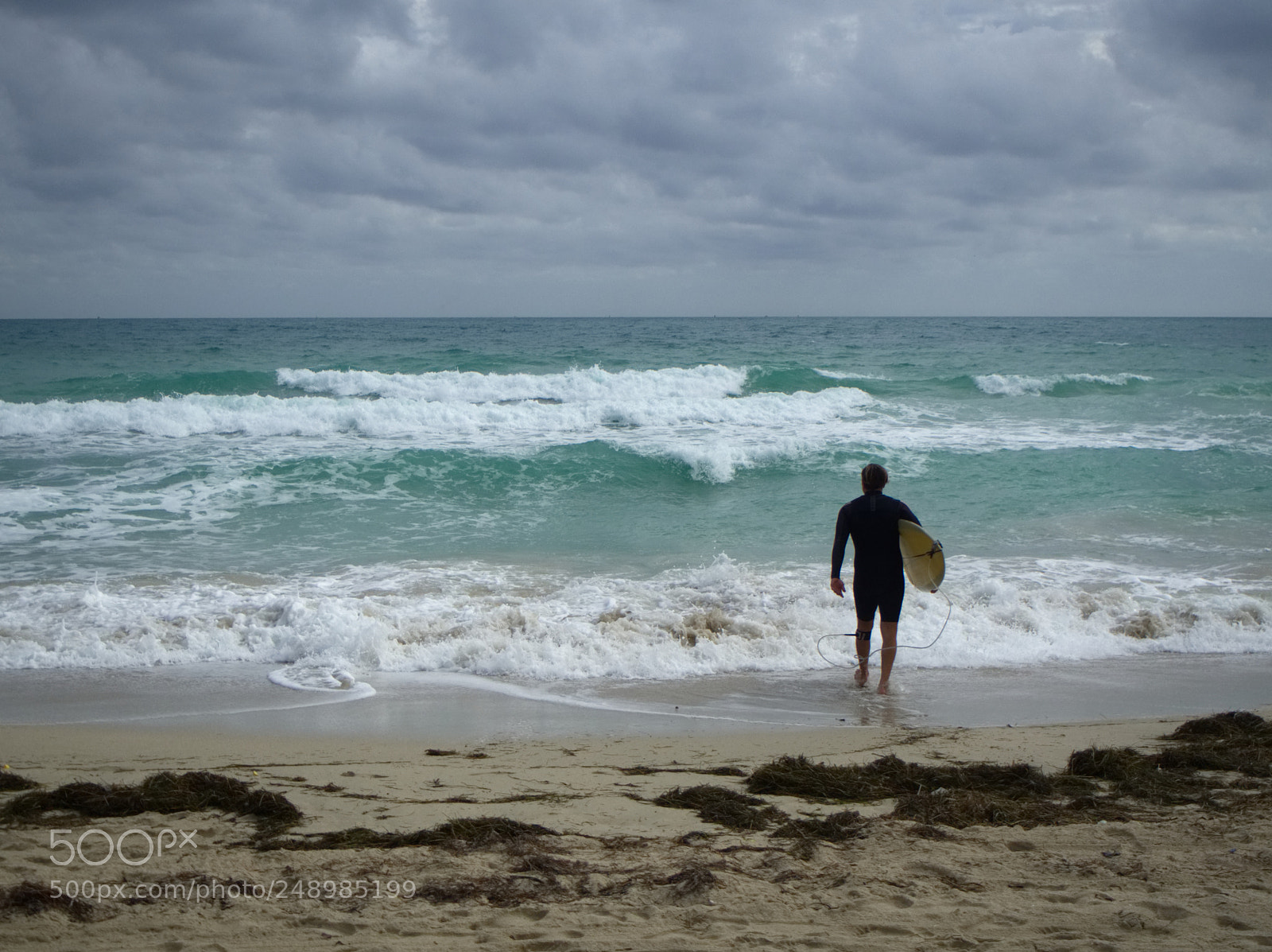 Olympus OM-D E-M10 sample photo. Surfer on the ocean photography