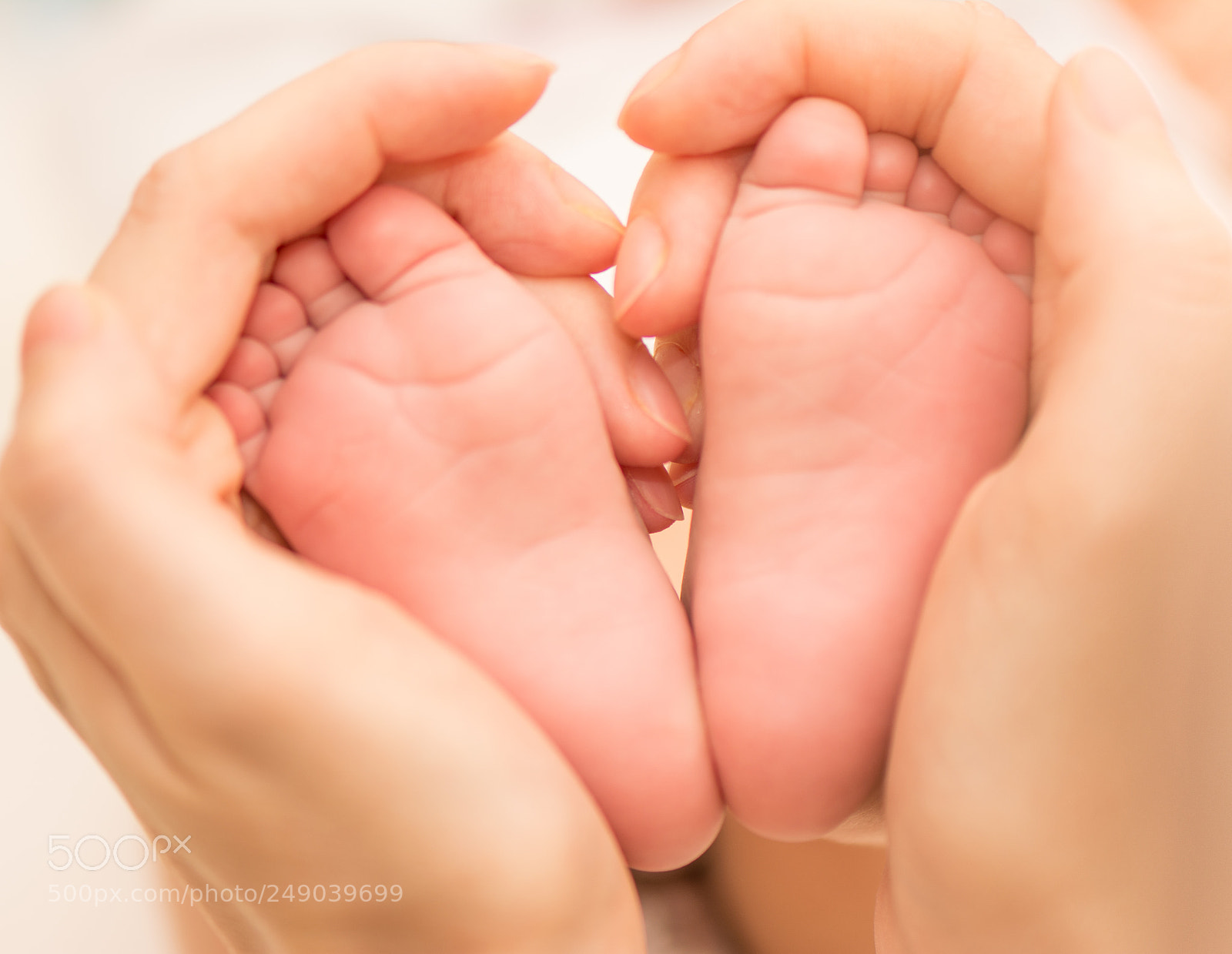 Nikon D5200 sample photo. Baby foot & mom hand photography