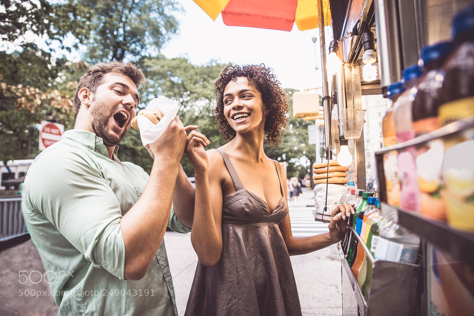 Nikon D610 sample photo. Couple at kiosk in photography