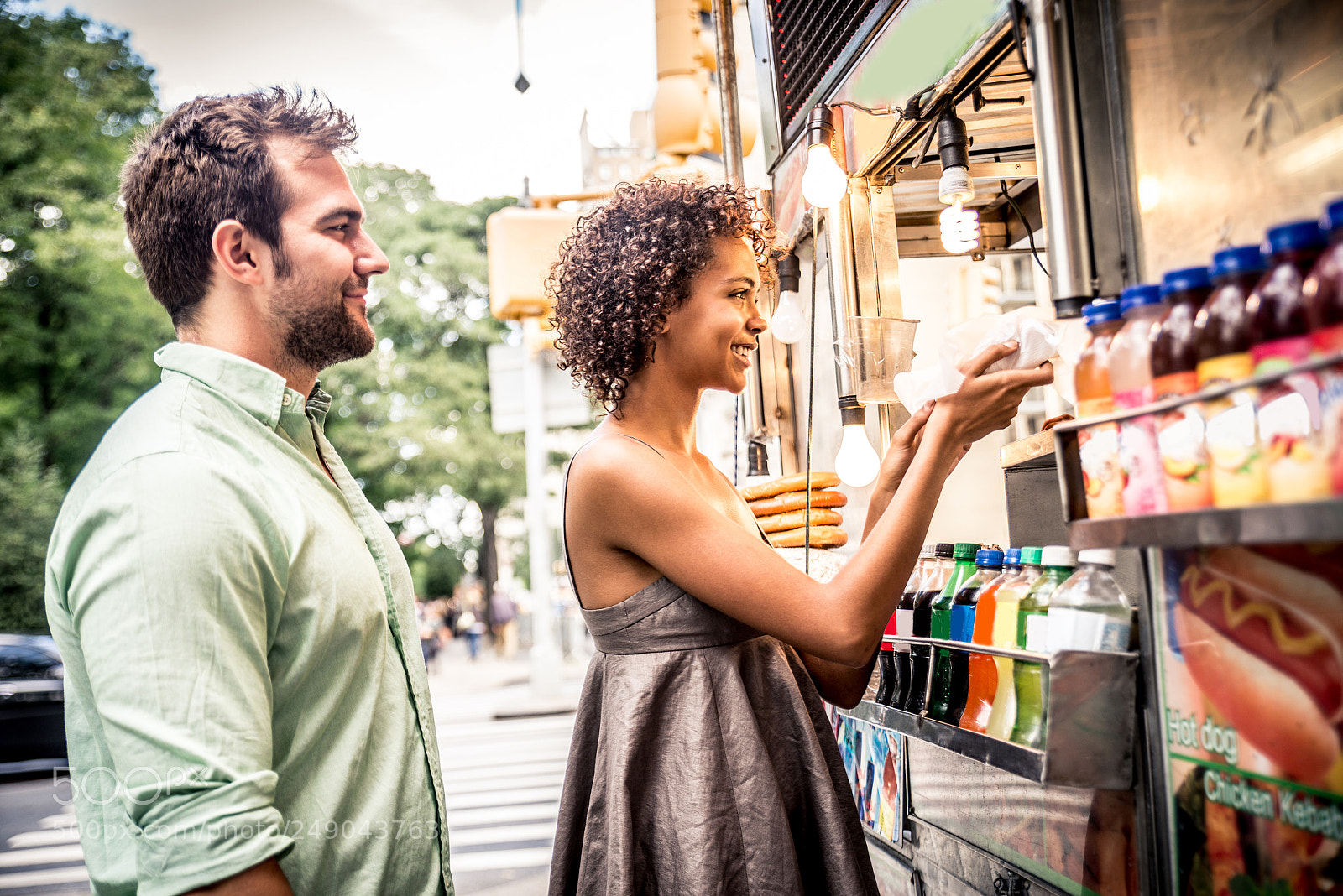 Nikon D610 sample photo. Couple at kiosk in photography