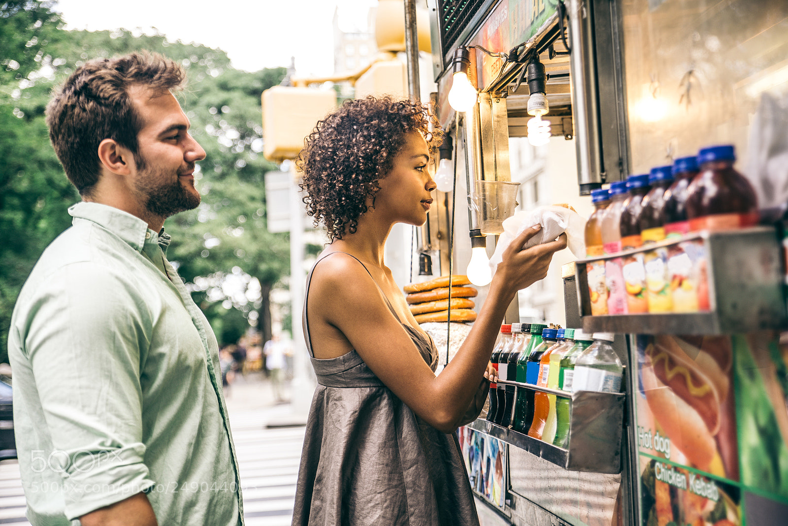 Nikon D610 sample photo. Couple at kiosk in photography