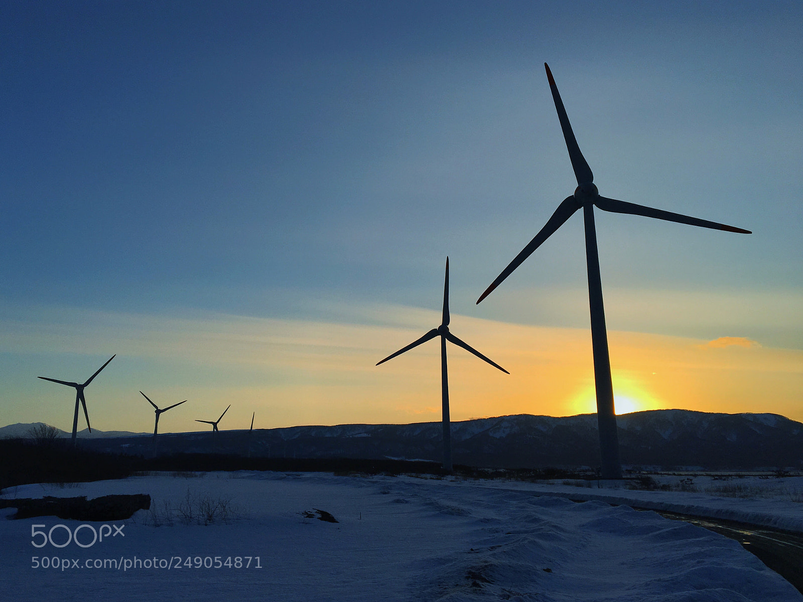 Apple iPhone 6s Plus sample photo. Sunset of windfarm photography