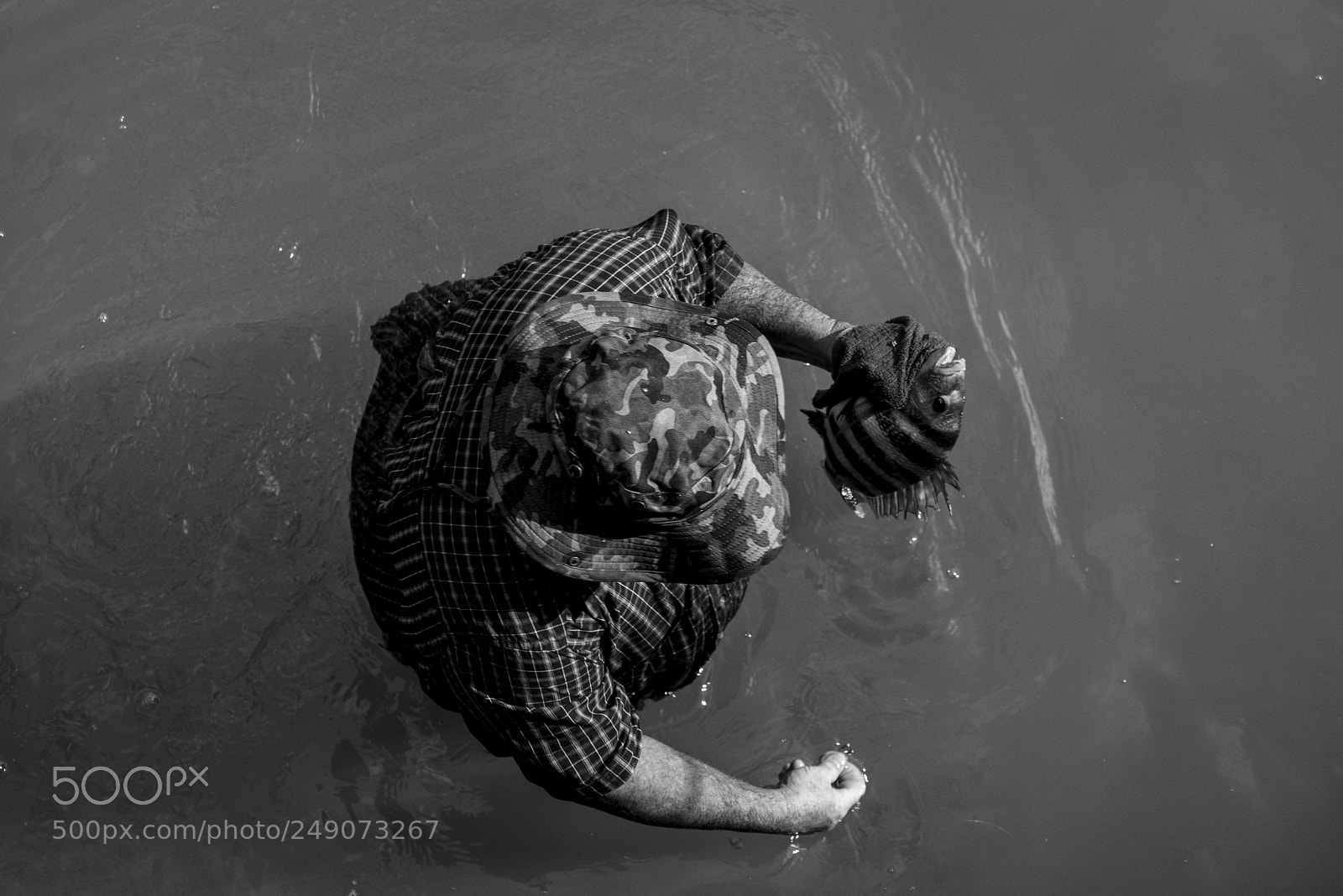 Pentax K-1 sample photo. Man with fish photography