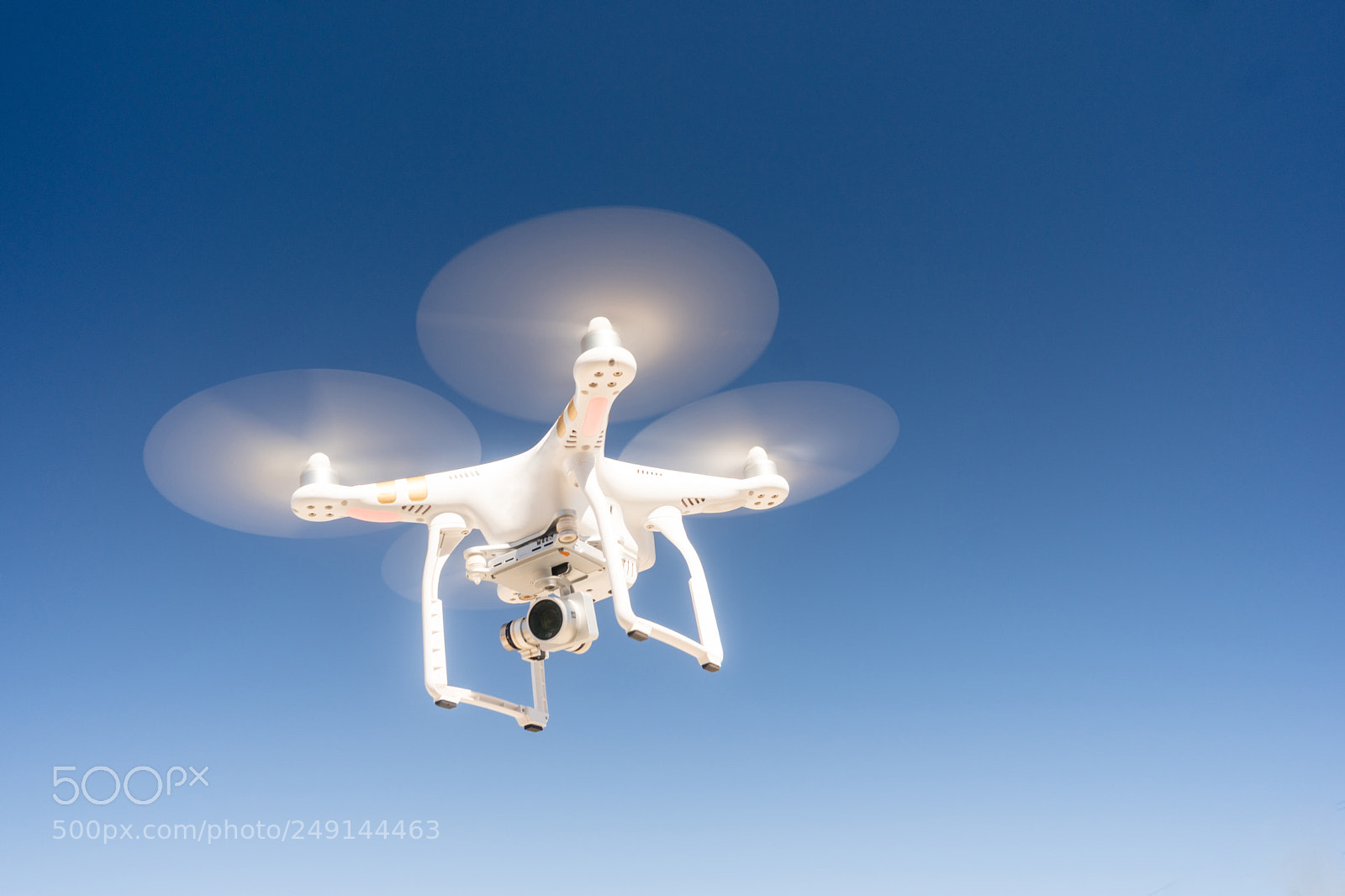 Sony a6300 sample photo. White quadcopter drone flying photography