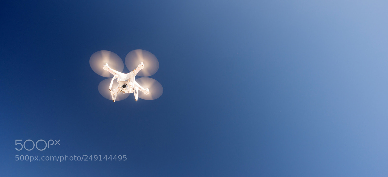 Sony a6300 sample photo. White quadcopter drone flying photography
