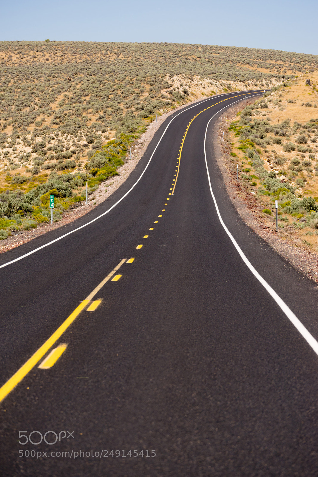 Sony a7 sample photo. Open road vertical dark photography