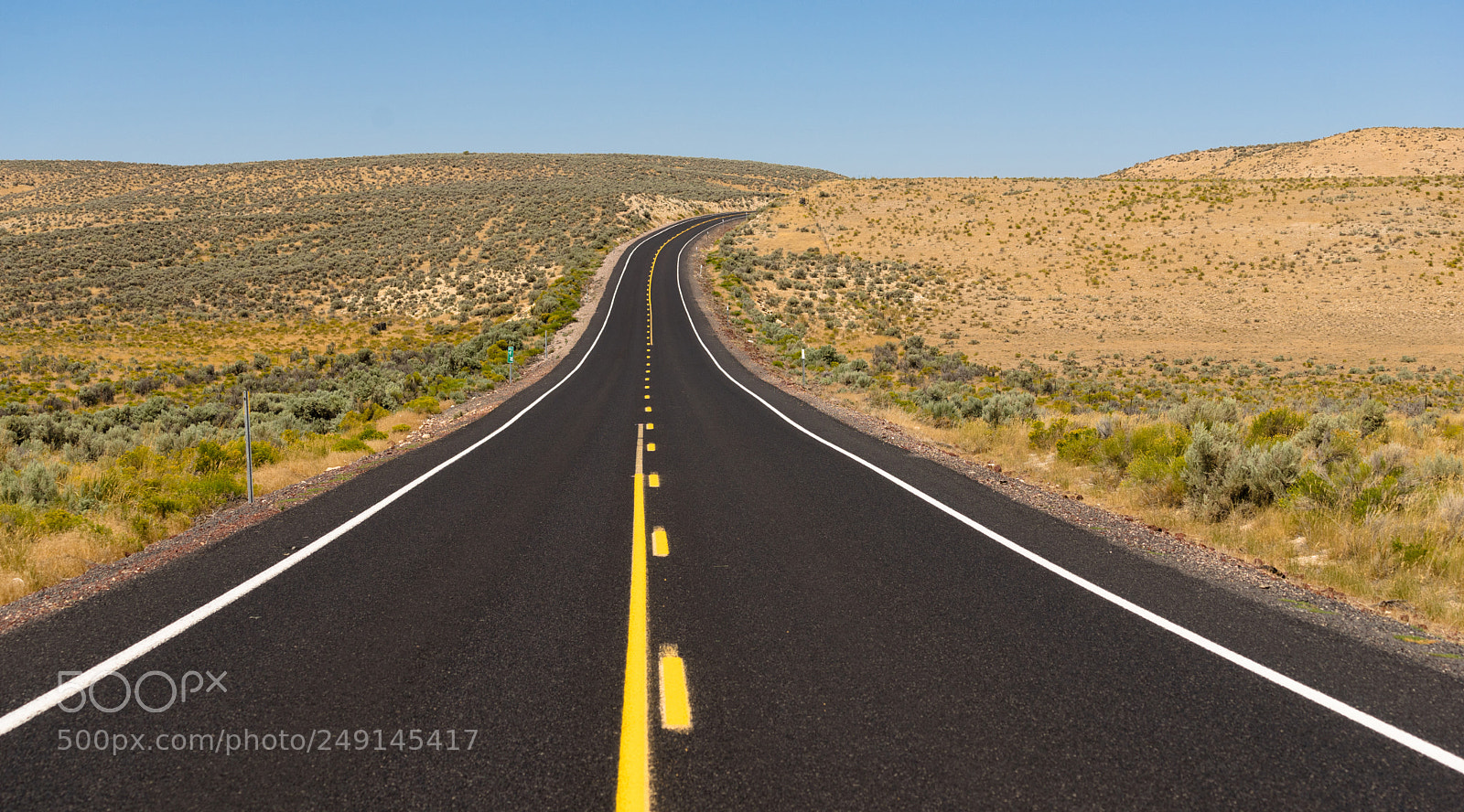 Sony a7 sample photo. Open road vertical dark photography