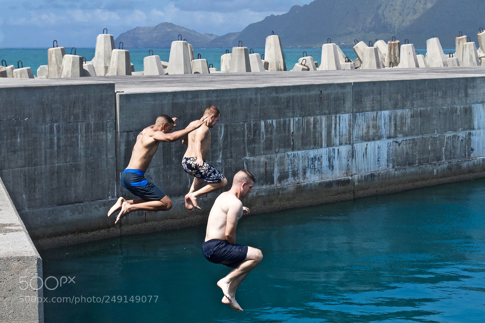 Canon EOS 7D sample photo. Jumping from the docks photography