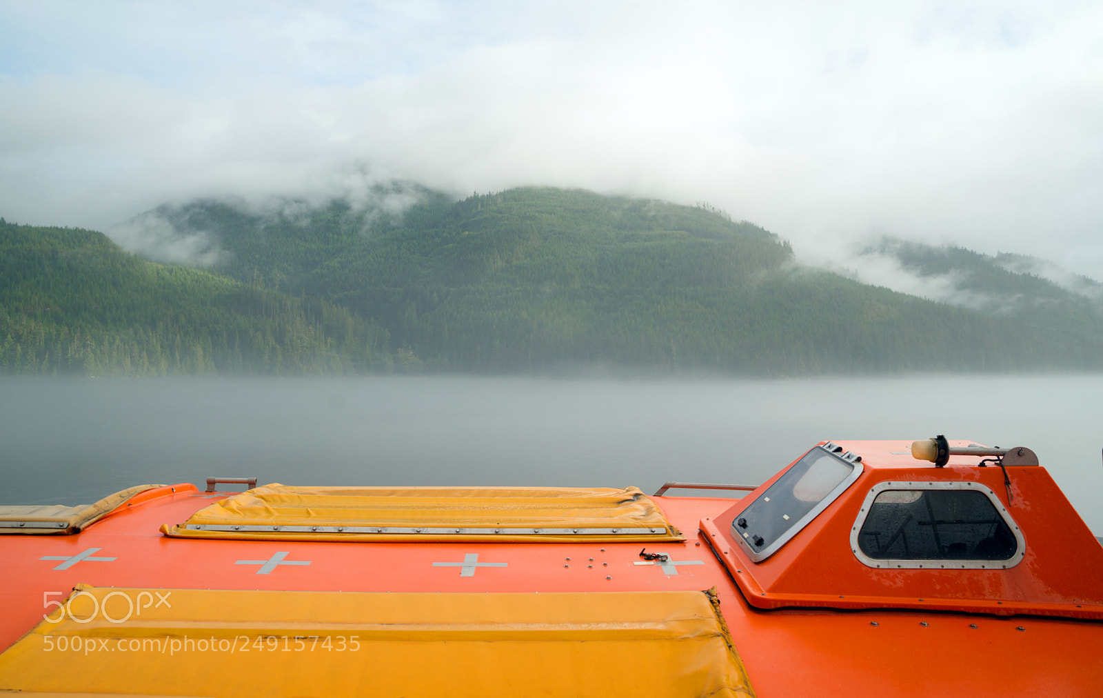 Sony Alpha DSLR-A850 sample photo. Orange lifeboat inside passage photography
