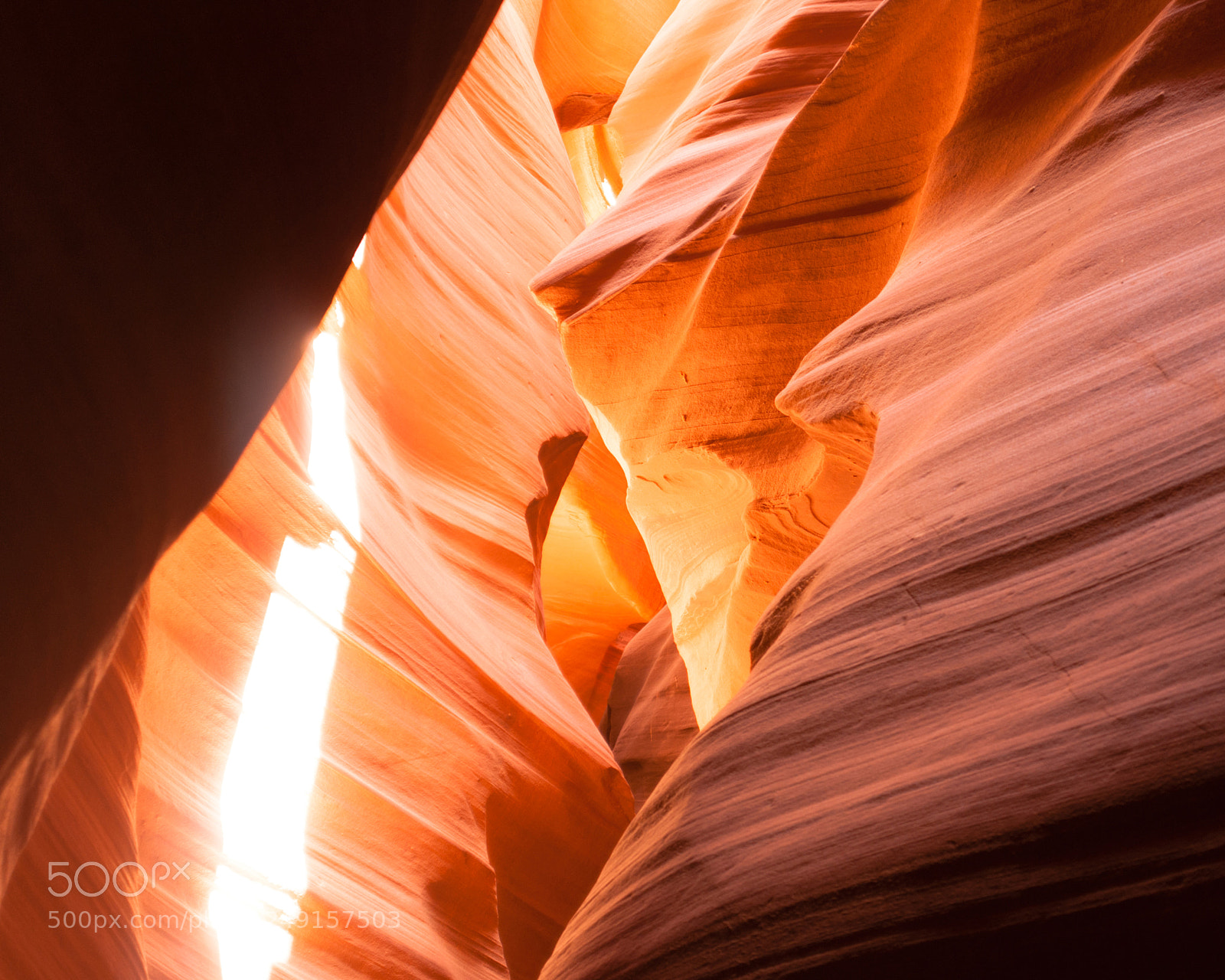 Sony Alpha DSLR-A350 sample photo. Sunlight beams through crevasse photography