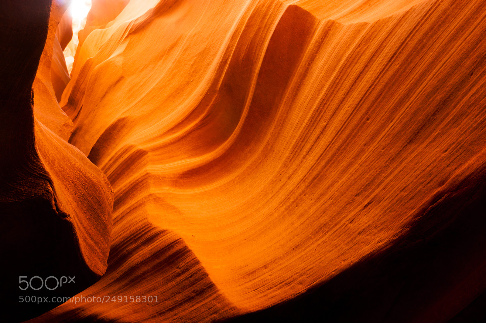Sony Alpha DSLR-A350 sample photo. Sunlight beams through crevasse photography