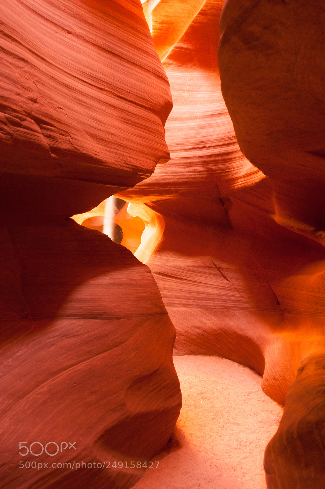Sony Alpha DSLR-A350 sample photo. Sunlight beams sandstone rock photography
