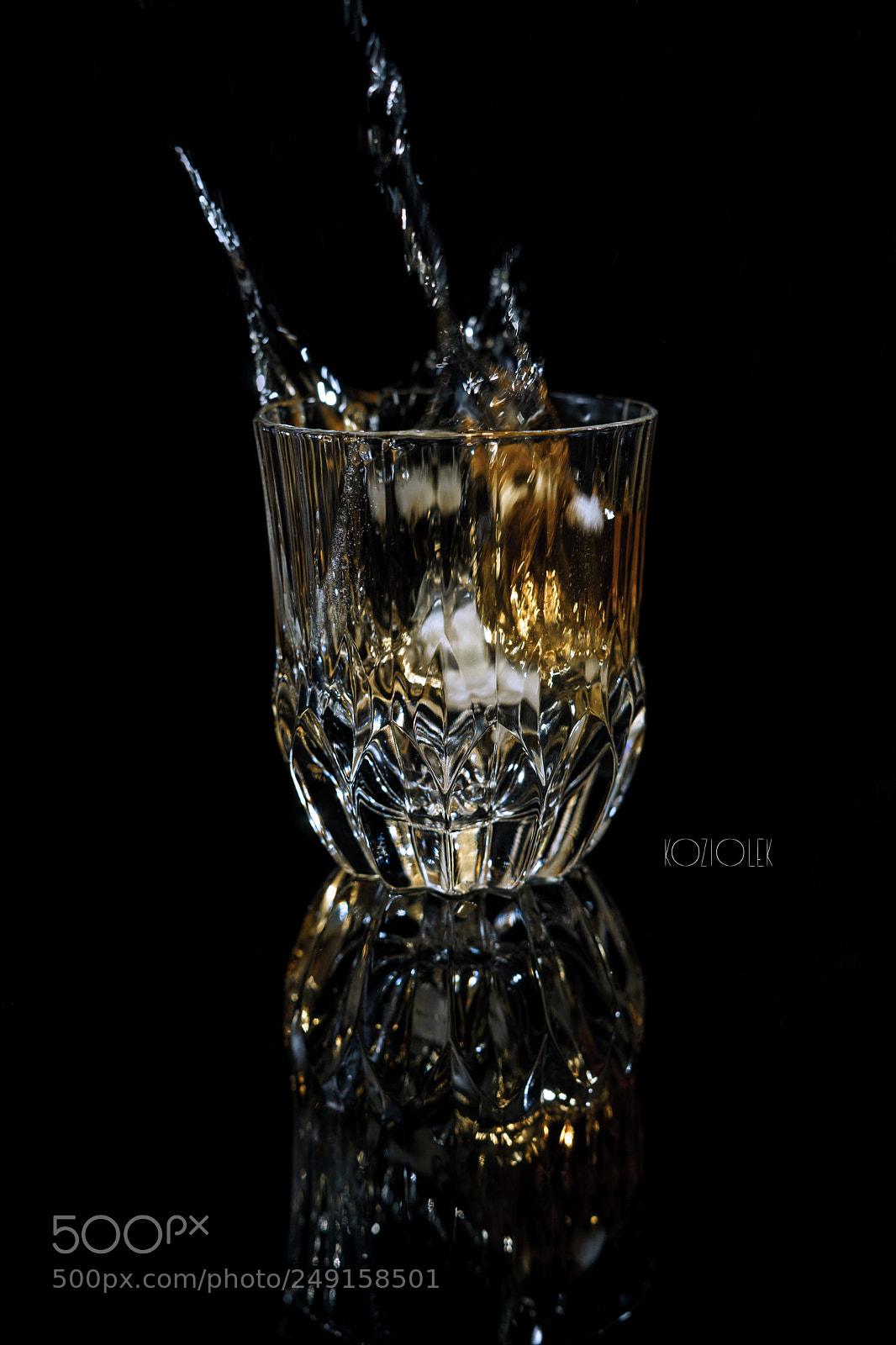 Sony a7 sample photo. Whisky splash photography