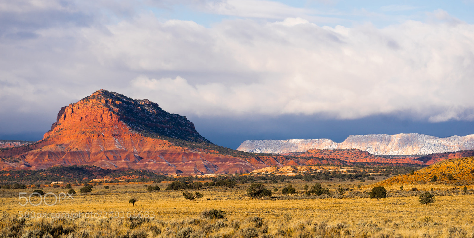 Sony a7 sample photo. Storm brewing sun hits photography