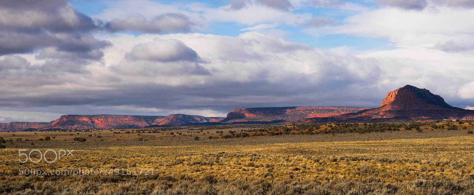 Sony a7 sample photo. Storm brewing sun hits photography