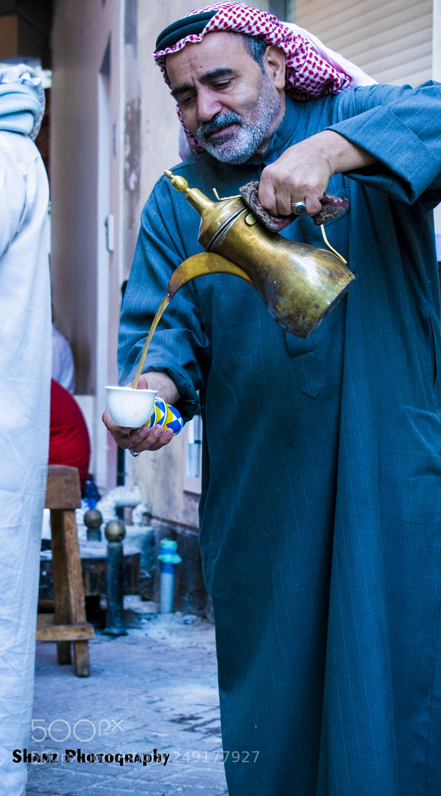 Nikon D5300 sample photo. Arabic man serving tea photography