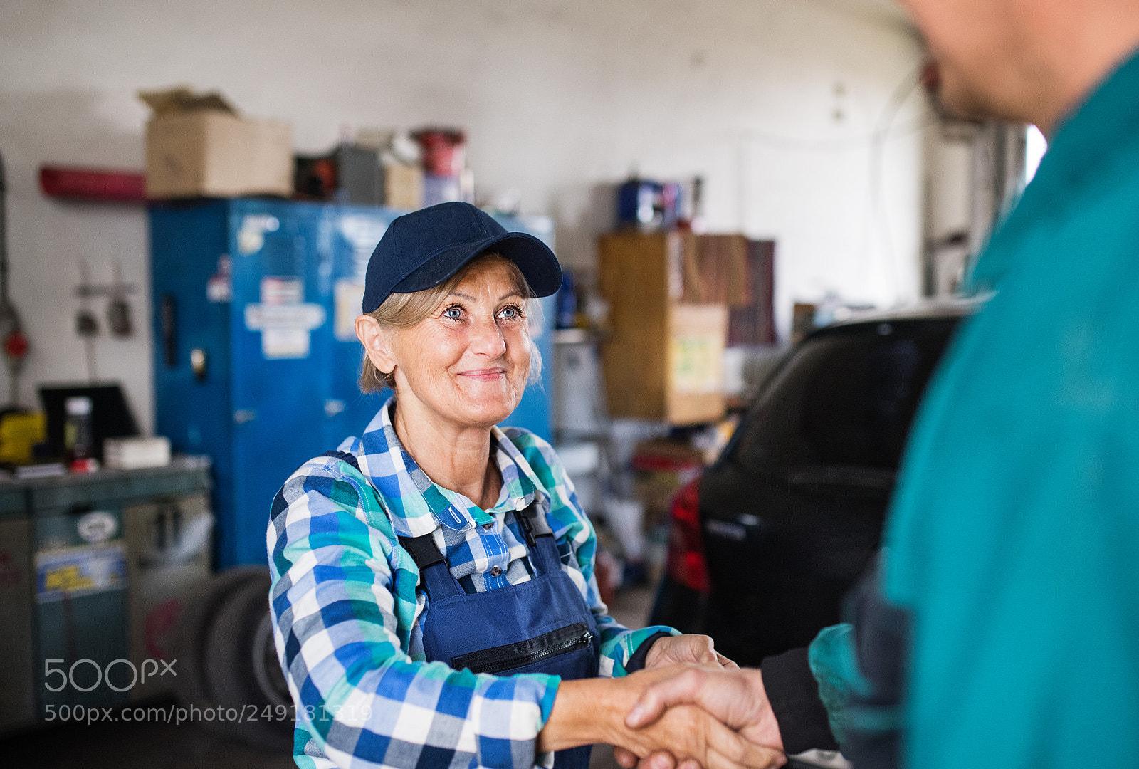 Nikon D5 sample photo. Senior female mechanic repairing photography