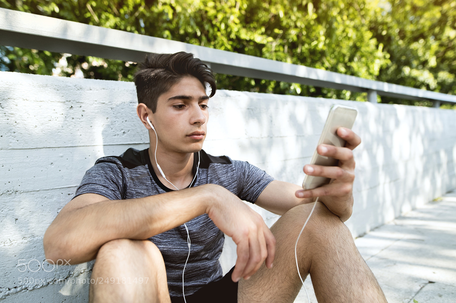 Nikon D5 sample photo. Runner with smartphone in photography