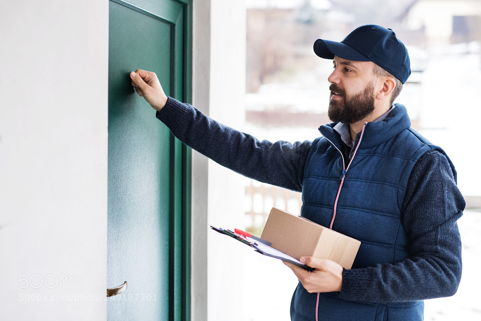 Nikon D5 sample photo. Delivery man delivering parcel photography