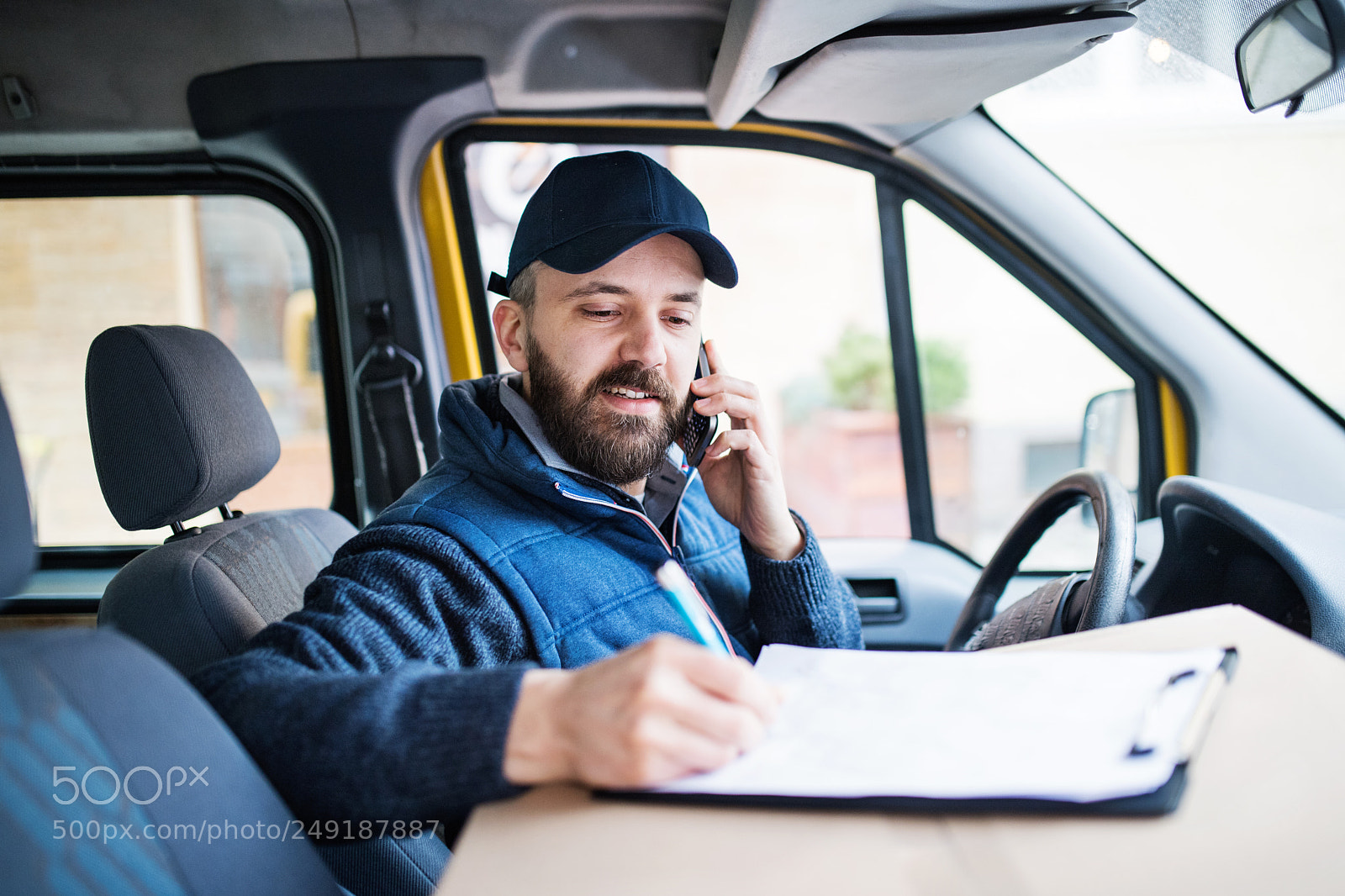 Nikon D5 sample photo. Delivery man delivering parcel photography