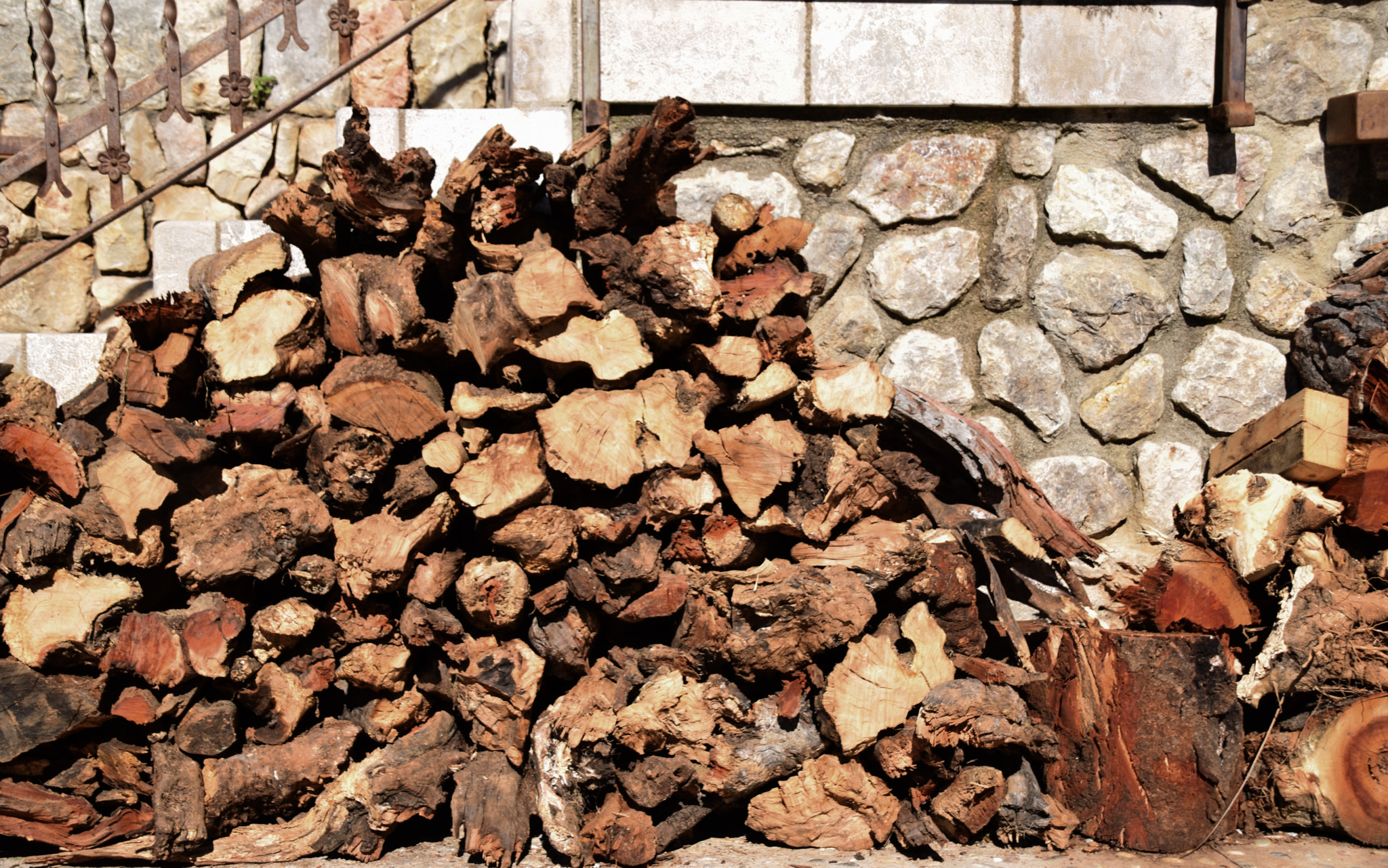 Sigma 18-250mm F3.5-6.3 DC Macro OS HSM sample photo. Firewood pile photography
