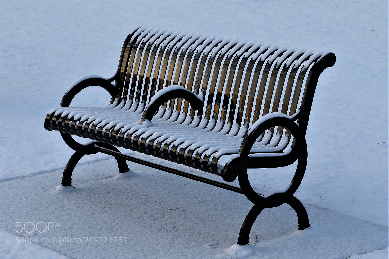 Canon EOS 7D Mark II sample photo. Snowy park bench photography