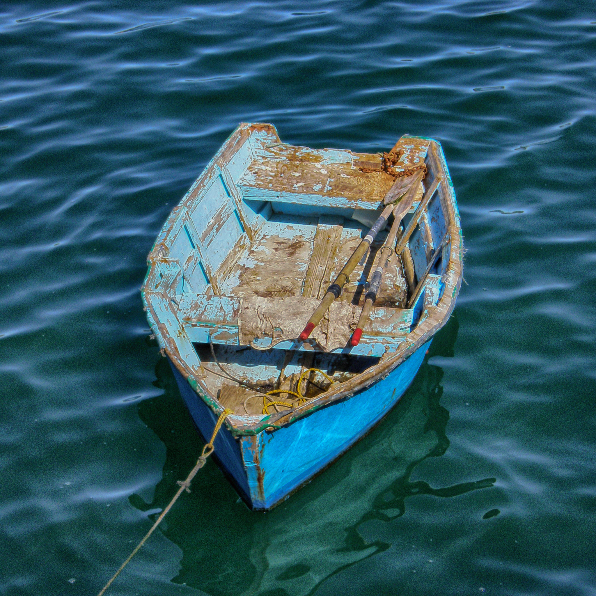 Olympus FE190/X750 sample photo. I am particularly fond of the touch of red on the oars.  such a beautiful contrast to all the blue. photography