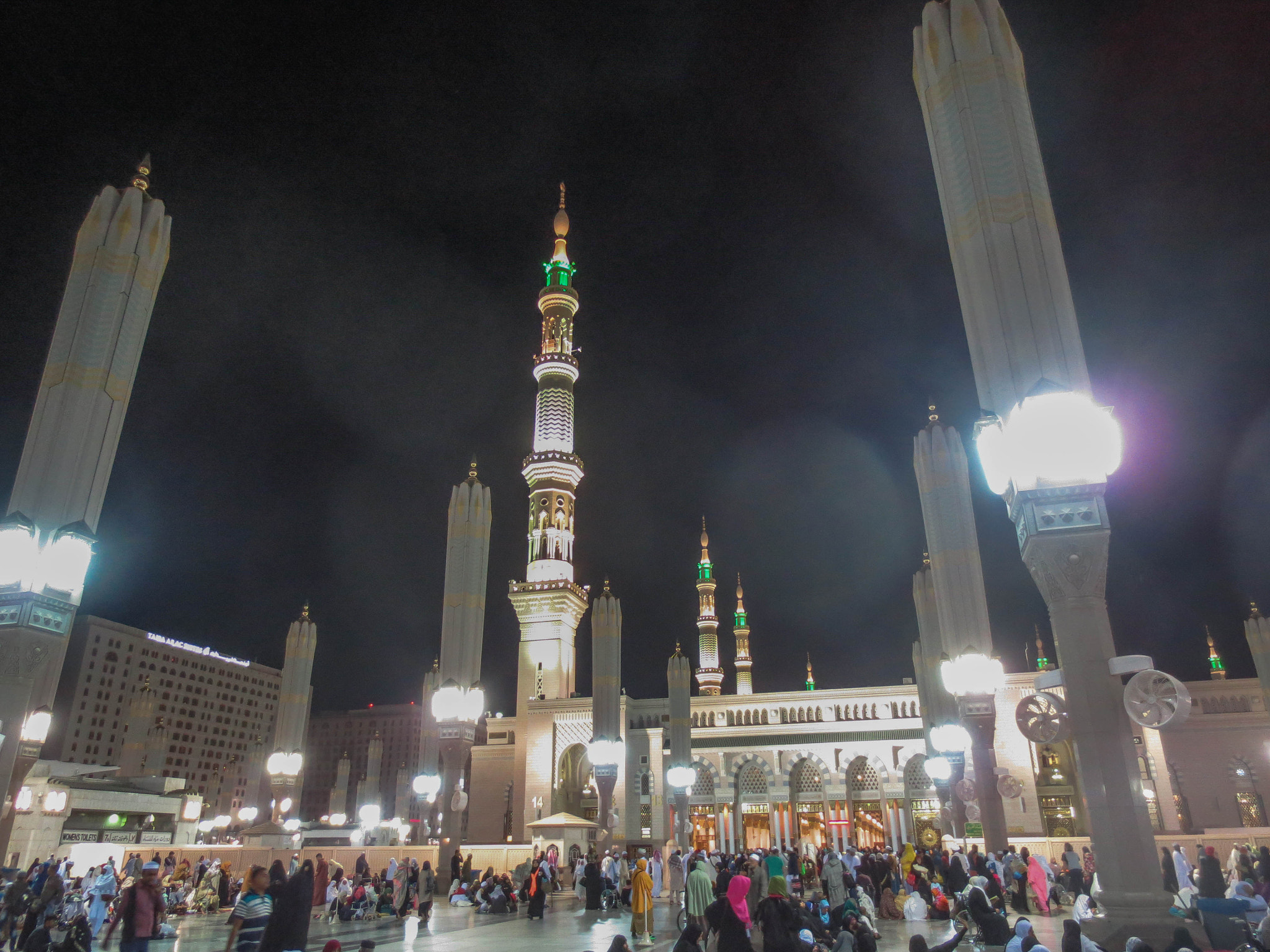 Canon POWERSHOT ELPH 320 HS sample photo. Pilgrims in masjid-e-nabvi photography