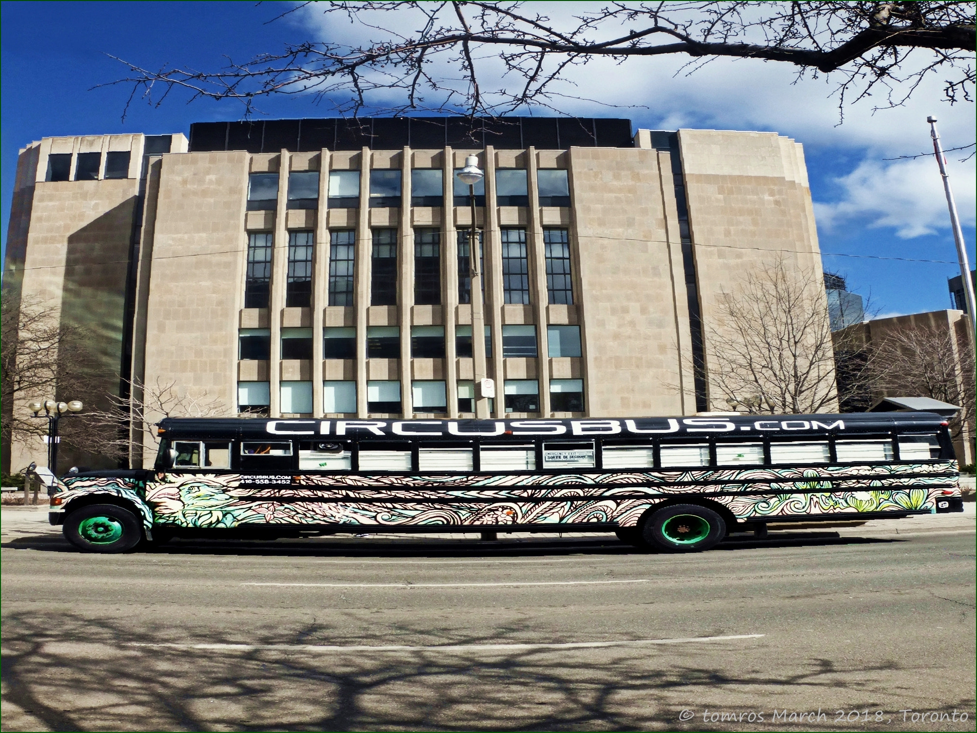 Panasonic Lumix DMC-ZS25 (Lumix DMC-TZ35) sample photo. People on the move. circus bus on university ave. photography