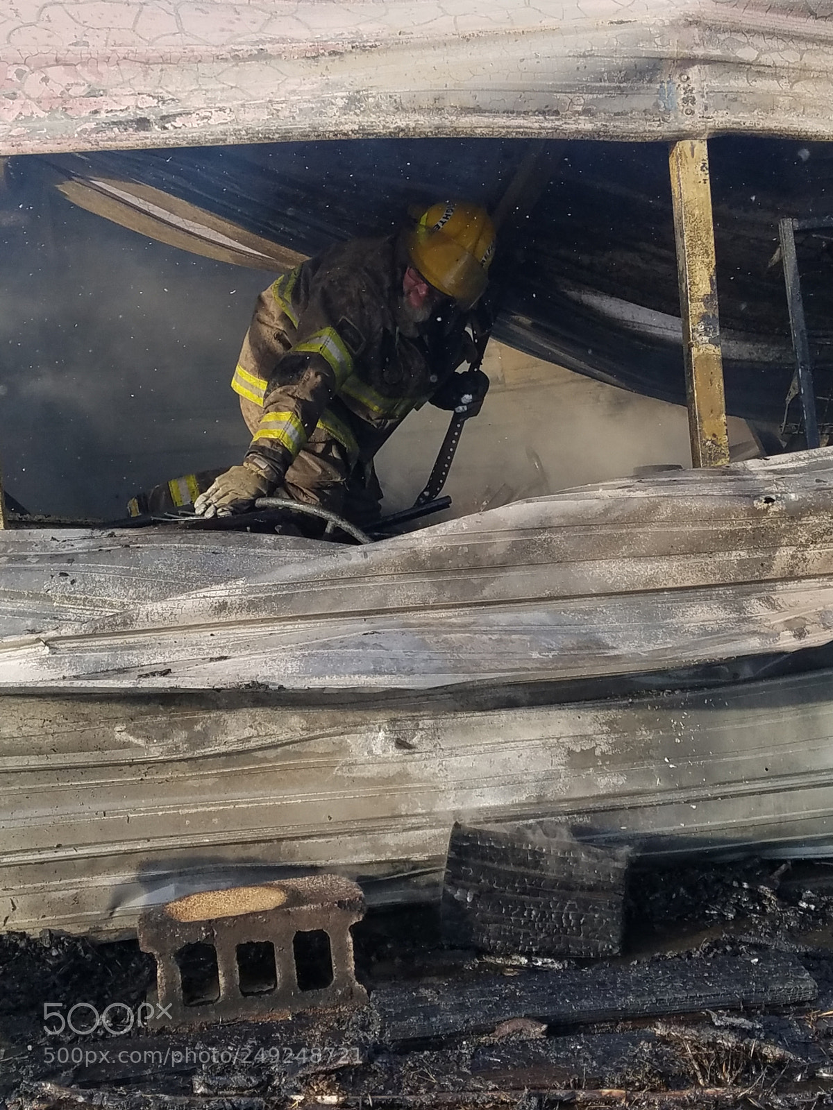 Samsung Galaxy S7 sample photo. Firefighter in shed photography