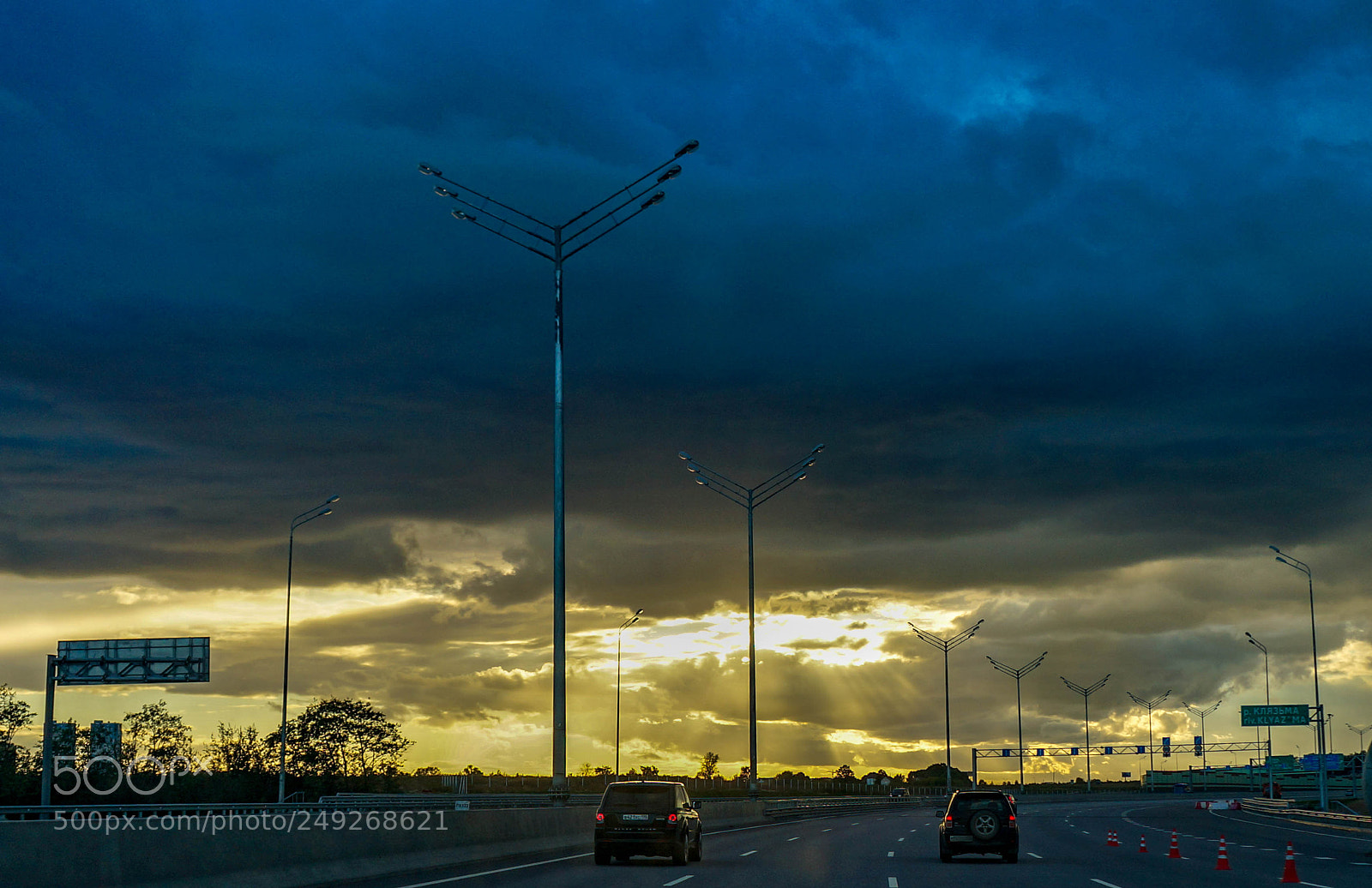 Sony Alpha NEX-5R sample photo. Clouds over the road photography