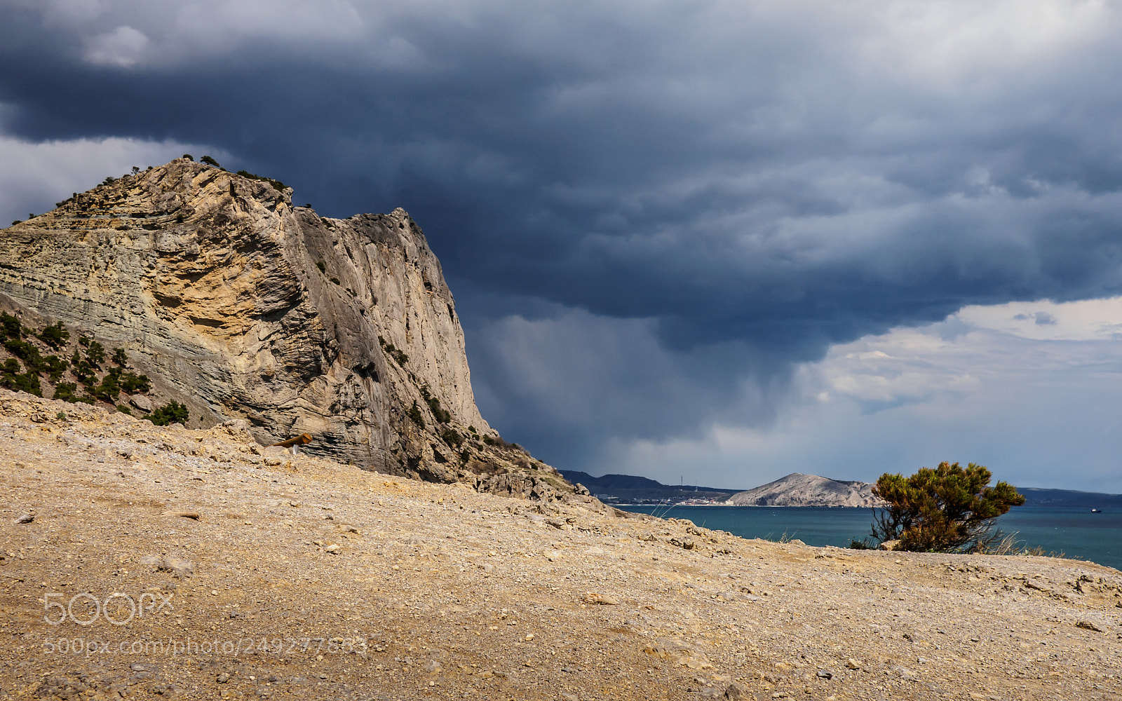 Olympus OM-D E-M10 sample photo. Rain and the sea photography
