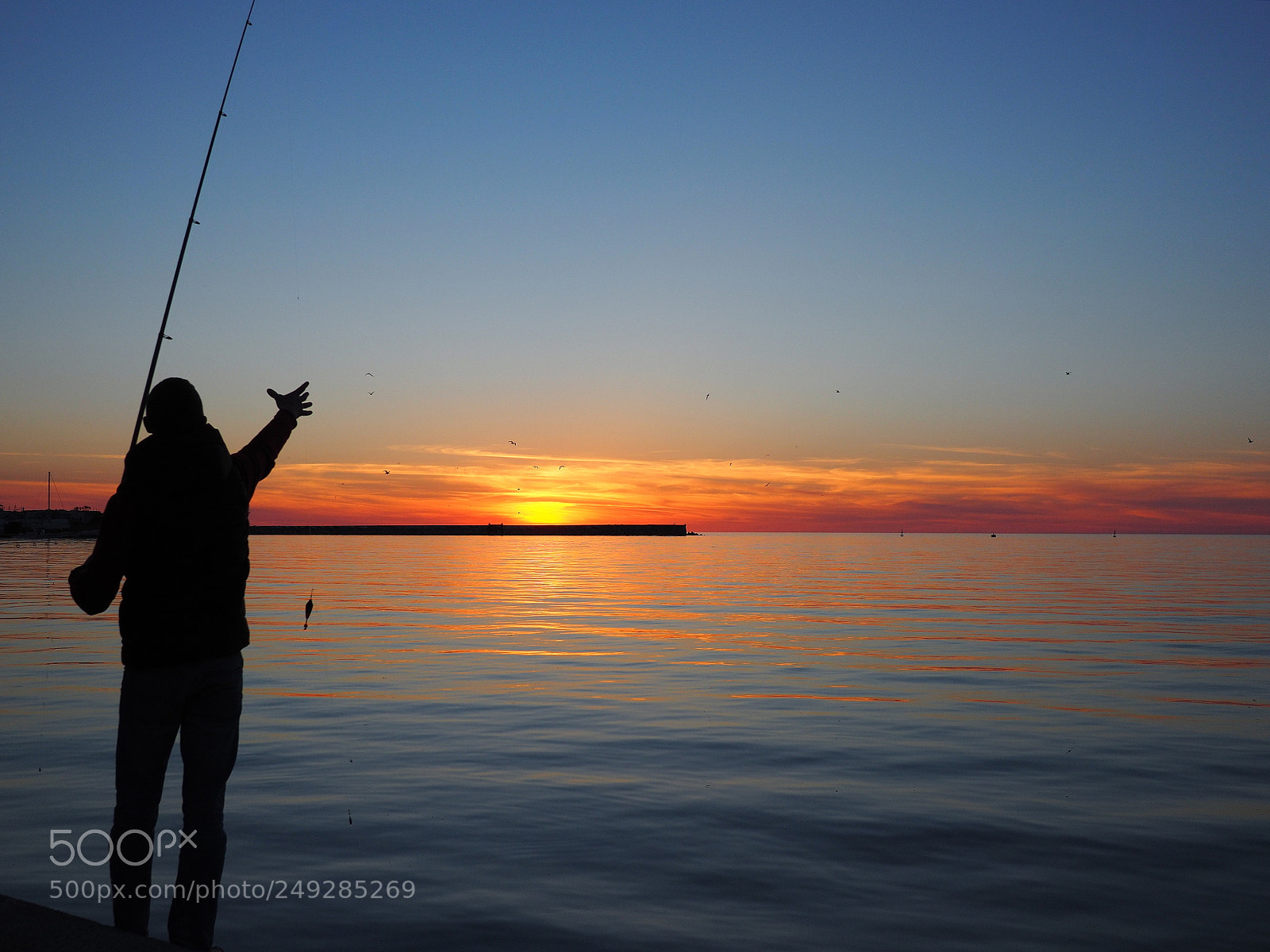 Olympus OM-D E-M10 sample photo. City fishing photography