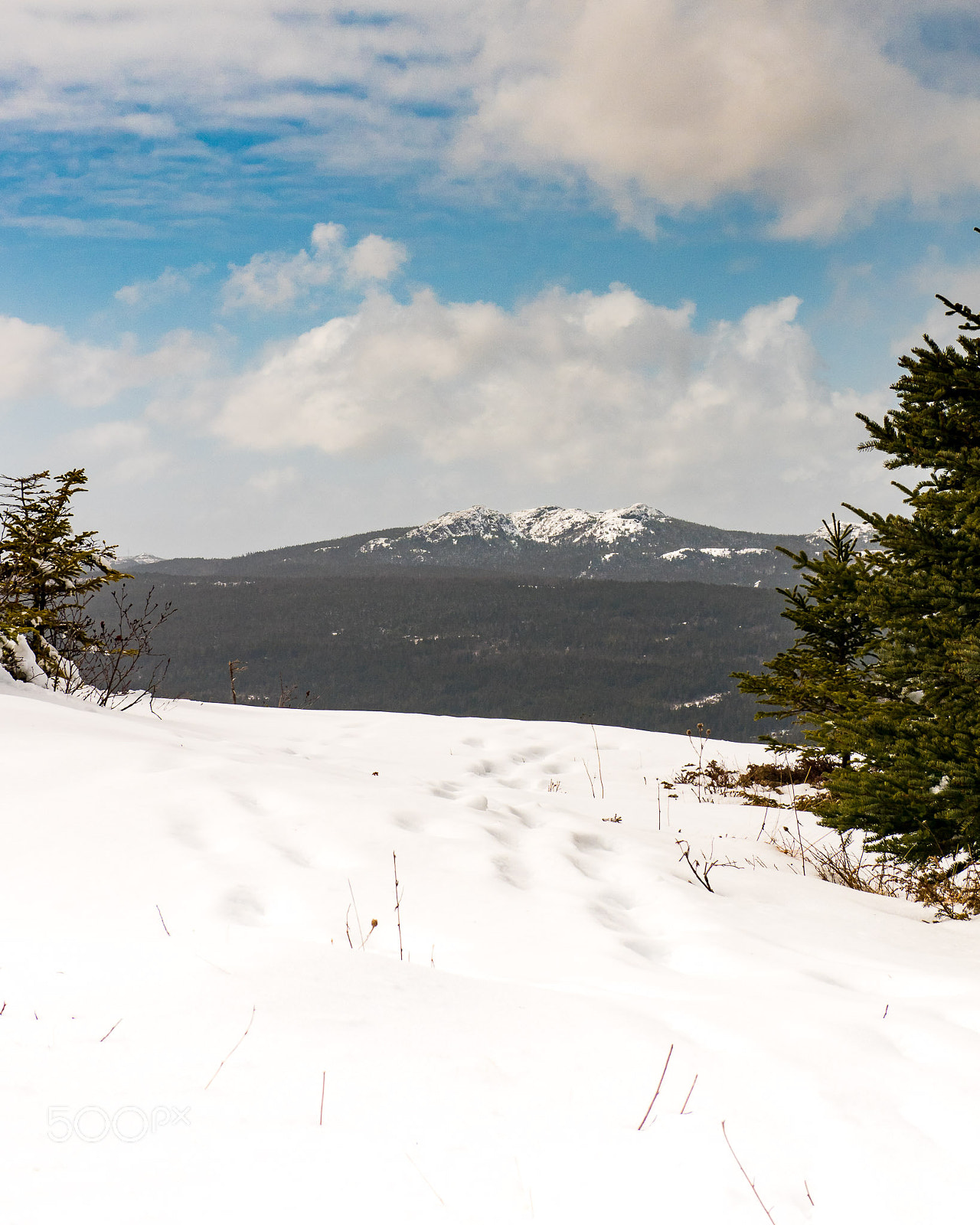 Panasonic Lumix DMC-GX85 (Lumix DMC-GX80 / Lumix DMC-GX7 Mark II) sample photo. Snowy hill tops in photography