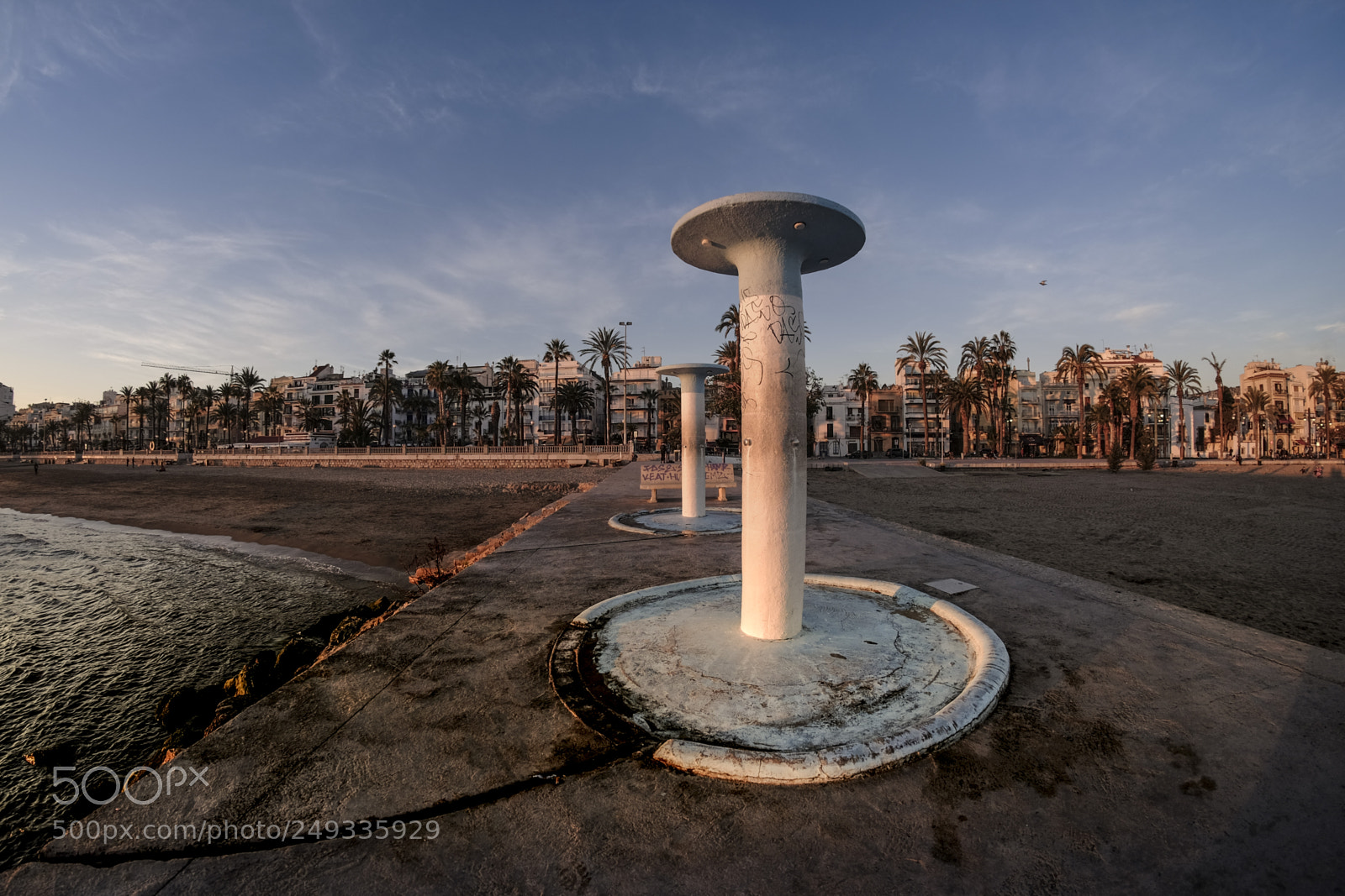 Fujifilm X-T10 sample photo. Sitges beach showers photography