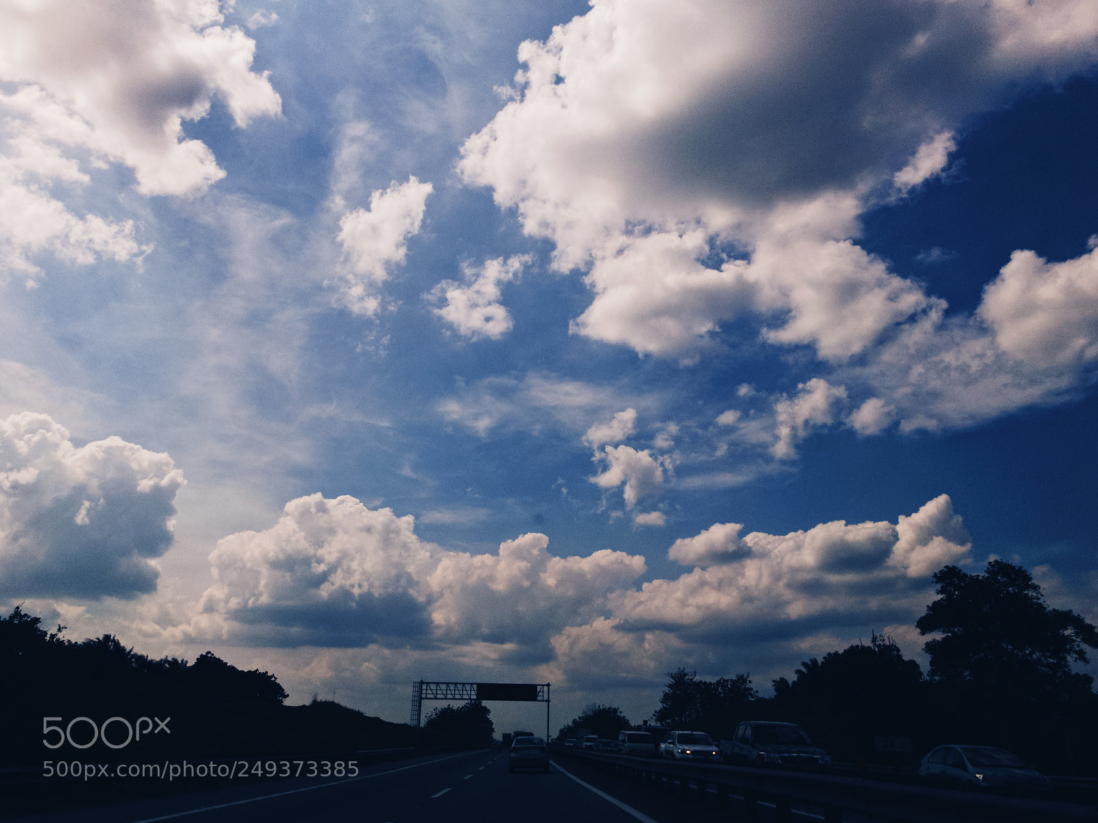 Apple iPhone 7 sample photo. Clouds on a roadtrip photography