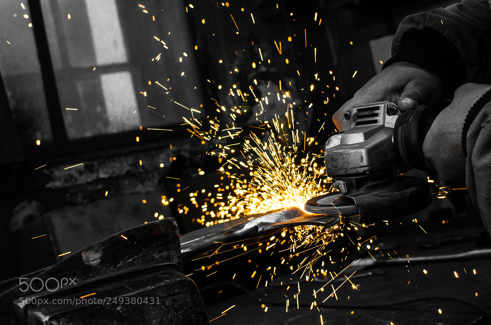 Nikon D7000 sample photo. Industrial grinder and sparks photography
