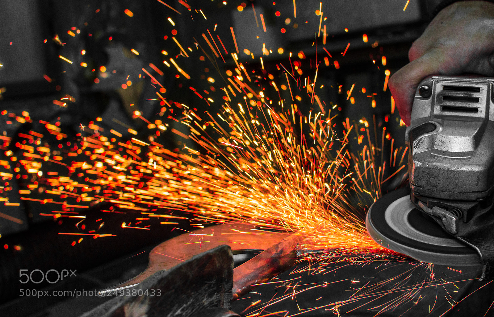 Nikon D7000 sample photo. Industrial grinder and sparks photography